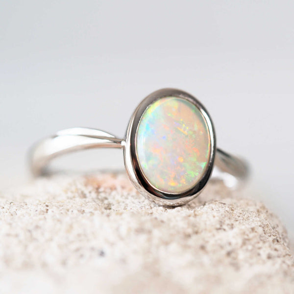 crystal opal ring set in 18ct white gold