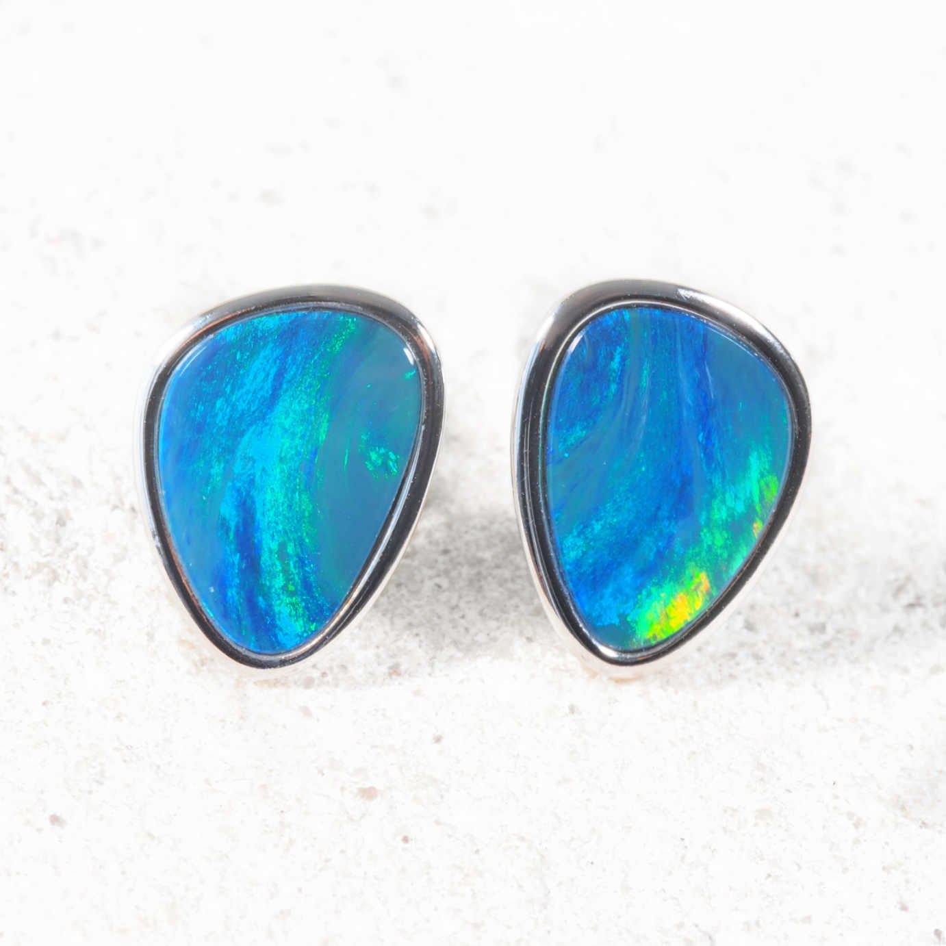 Genuine Australian opal doublet stud earrings in sterling silver with vivid blue and green play-of-colour