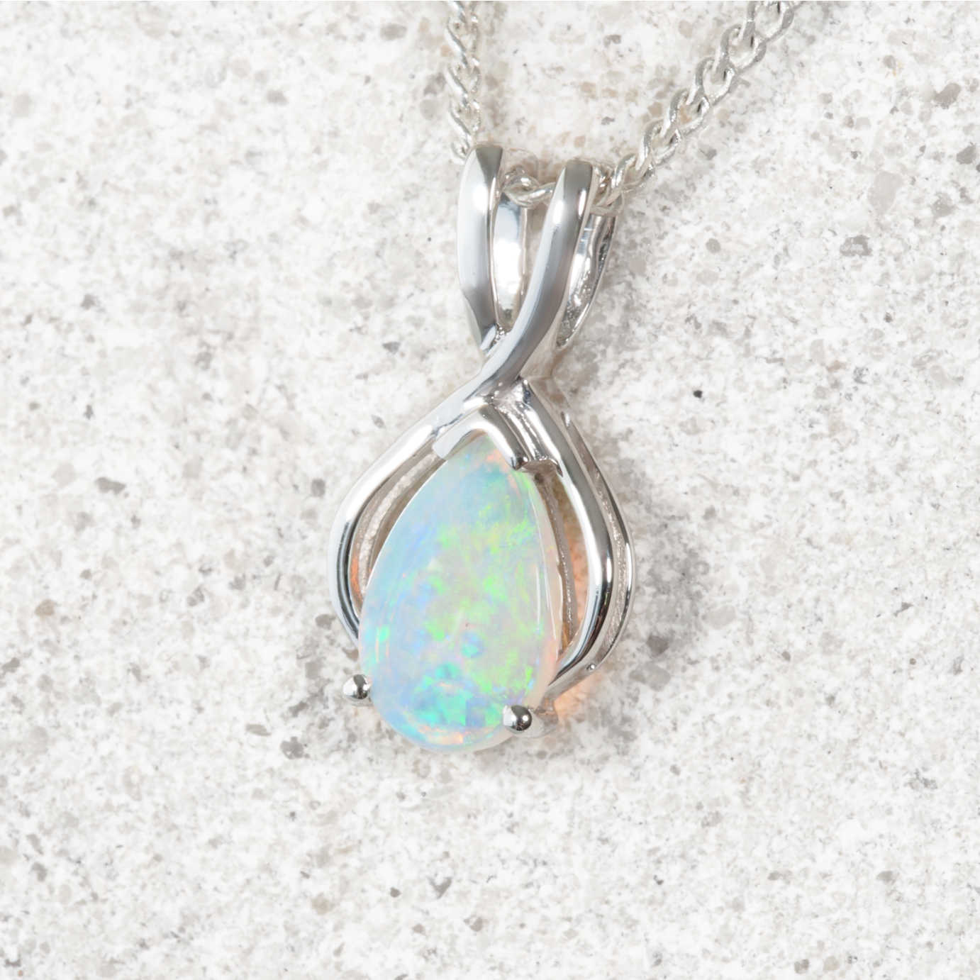 Australian crystal opal necklace in 9ct white gold featuring pear-shaped solid Coober Pedy opal