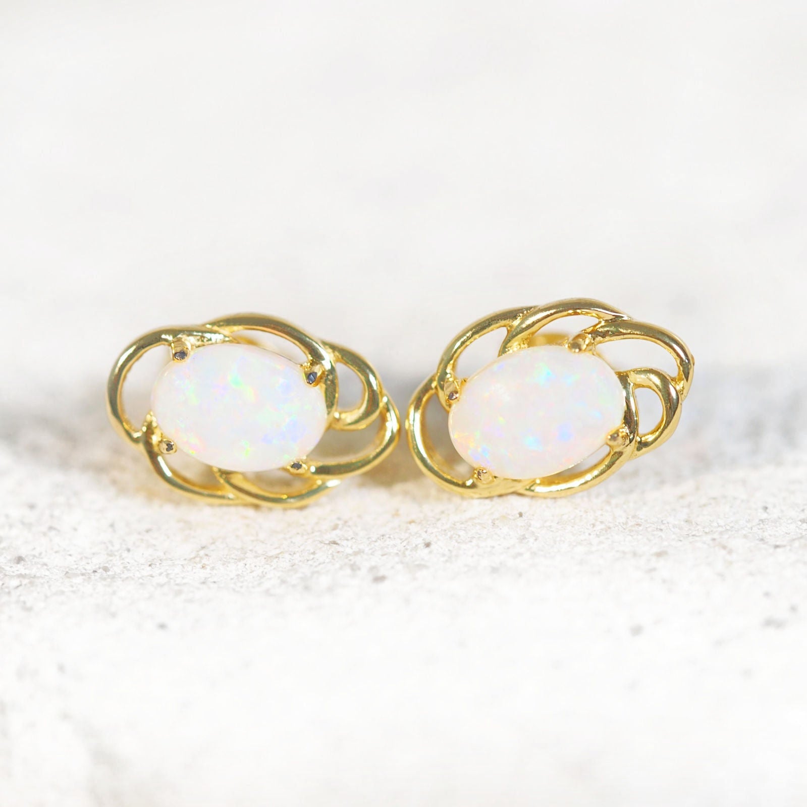 swirl design opal stud earrings