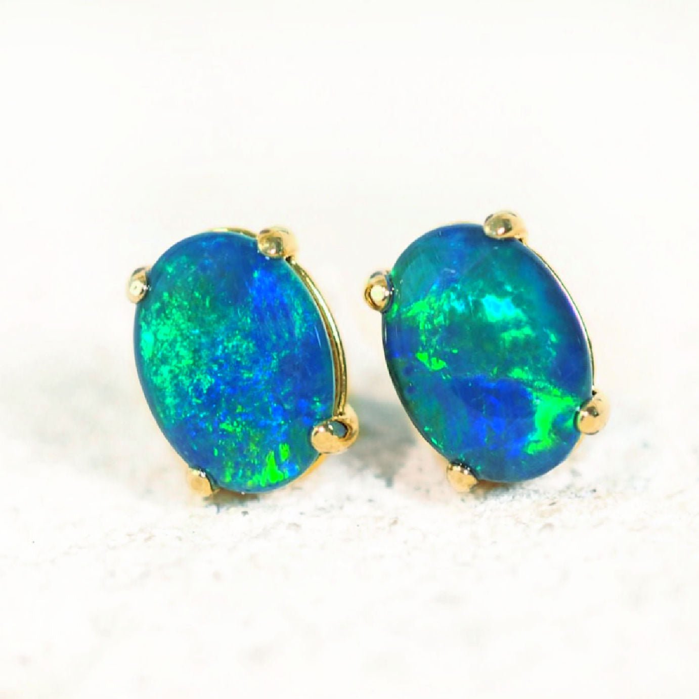 australian triplet opal earrings set in gold plated silver