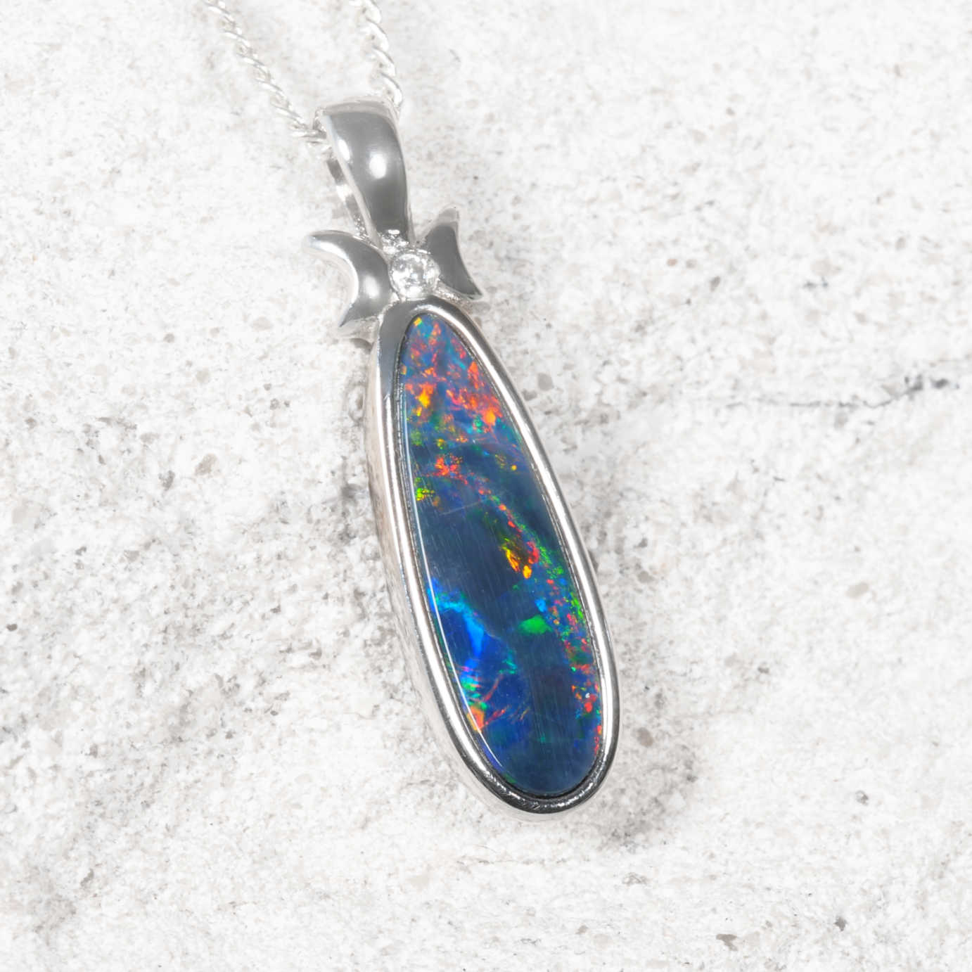 colourful opal doublet pendant set in sterling silver 
