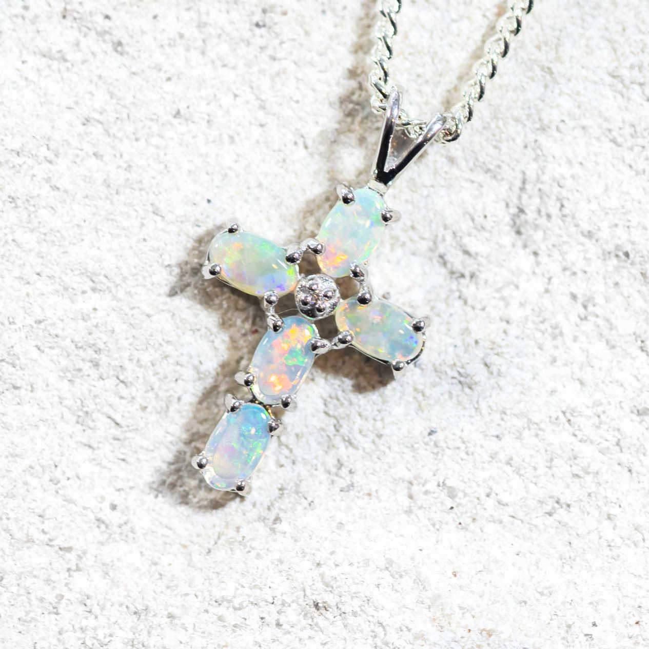 oval opal crss necklace in sterling silver