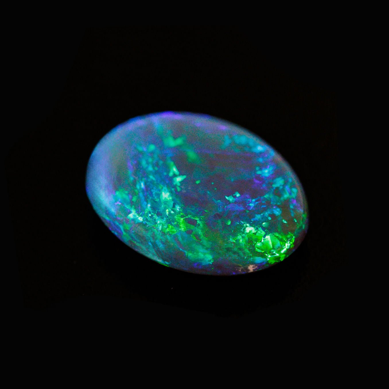 Ethically sourced Lightning Ridge opal with vivid sweeping flashes