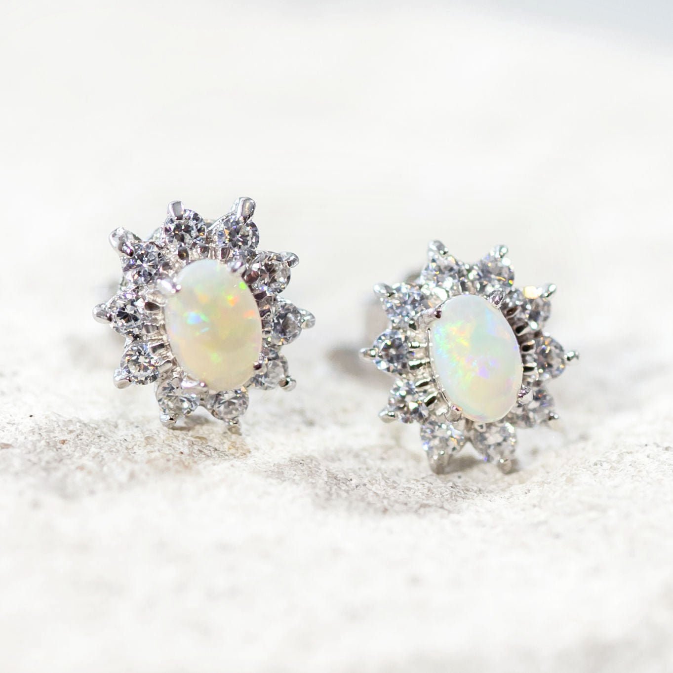 princess design opal earrings set in sterling silver