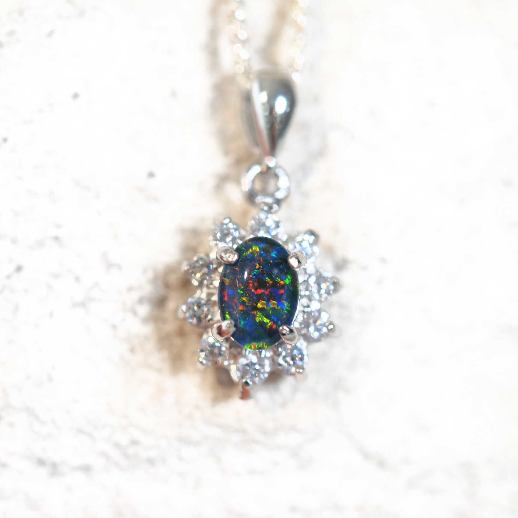 silver opal pendant with 10 sparkling diamantes