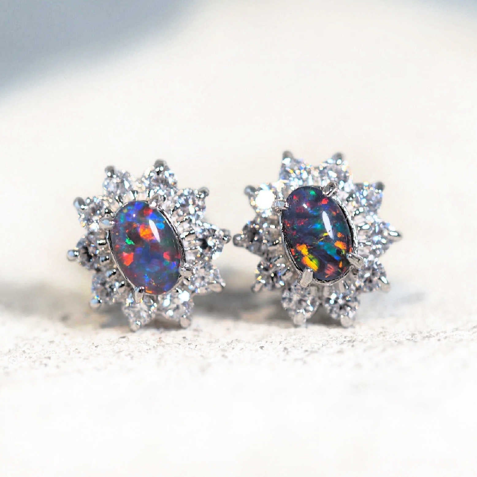 colourful silver princess design opal earrings