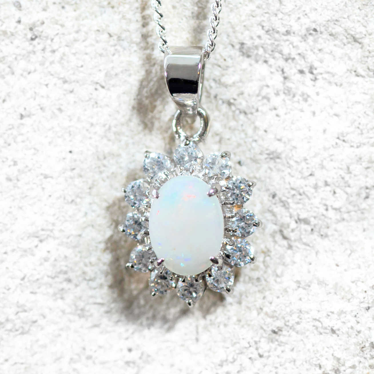 princess design opal pendant set in sterling silver