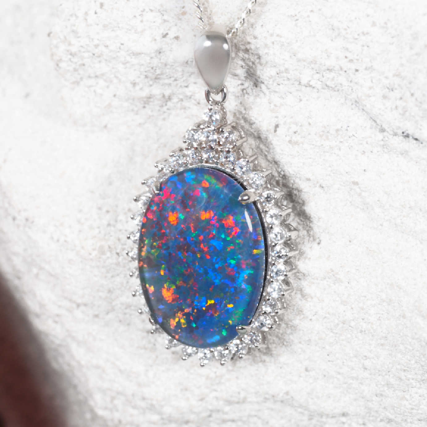 Elegant sterling silver statement opal necklace pendant featuring multi-coloured Australian triplet opal and halo of diamantés
