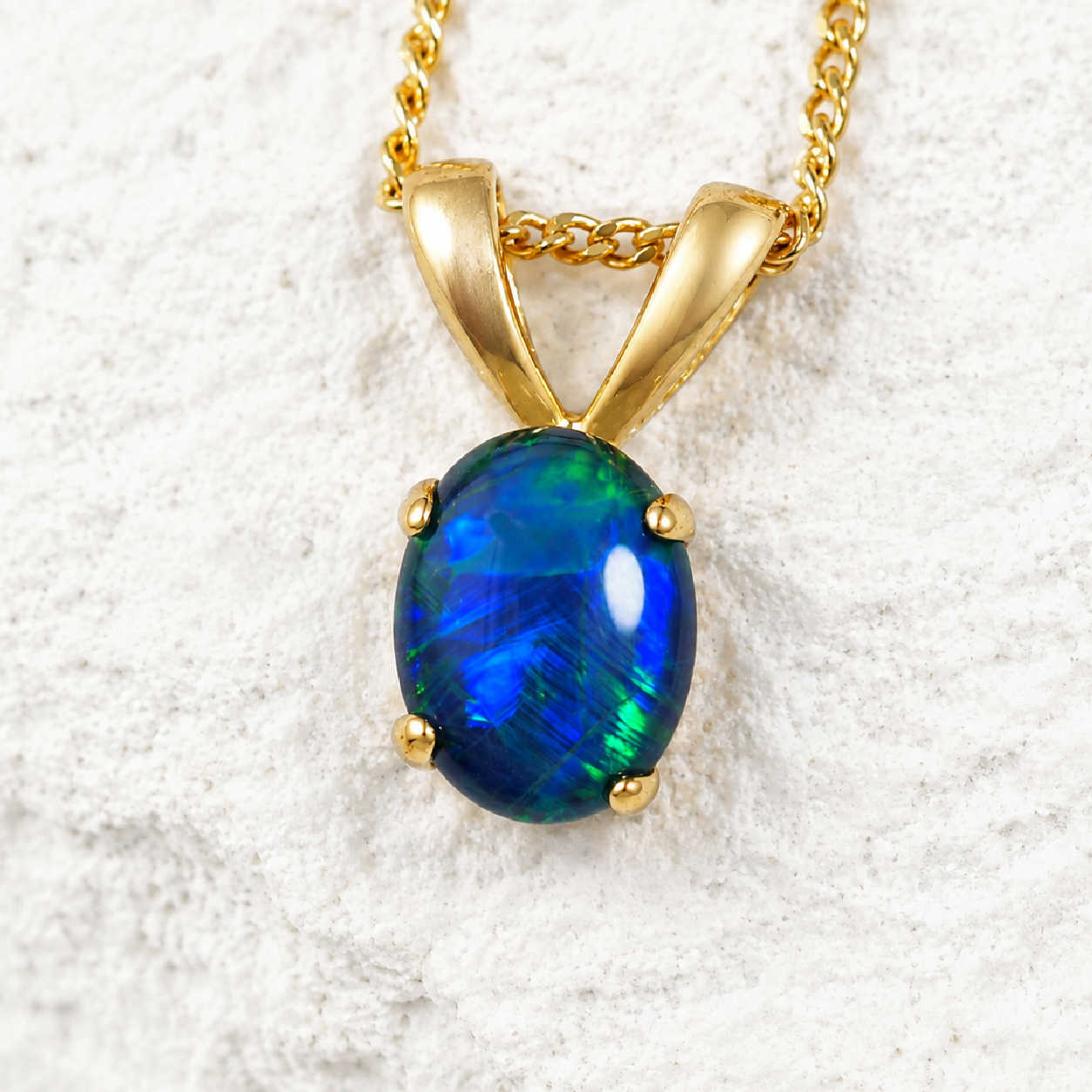 blue opal pendant in gold plated silver 