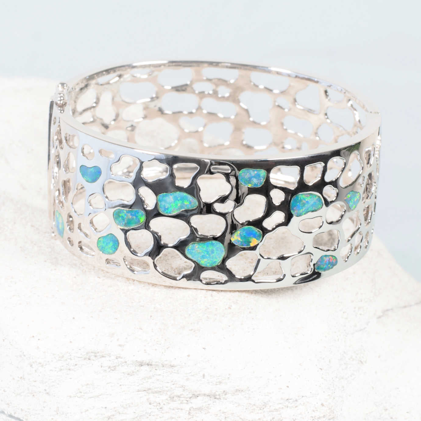 colourful opal bangle set in sterling silver