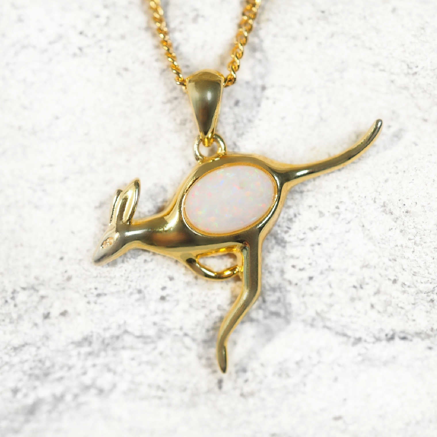 ‘Skippy’ gold-plated silver kangaroo opal pendant with bezel-set oval South Australian solid white opal in multi-coloured tones