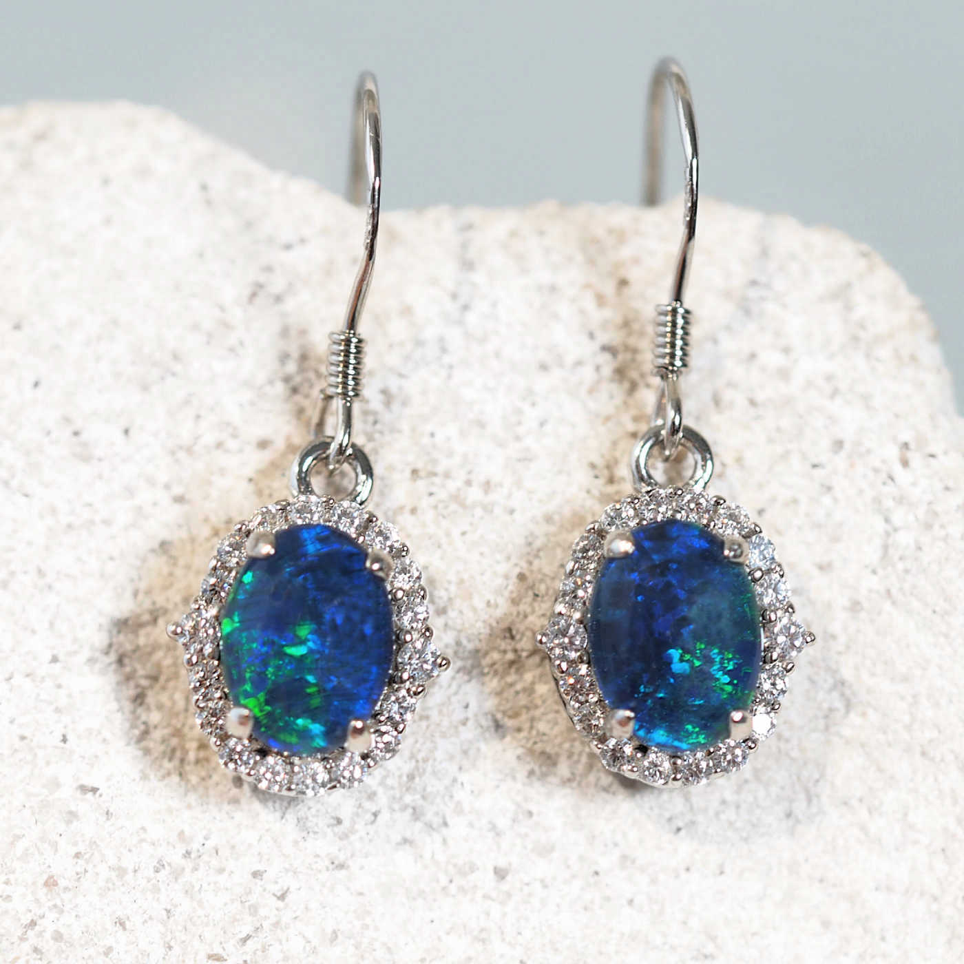 drop opal earrings with blue and green gemstones