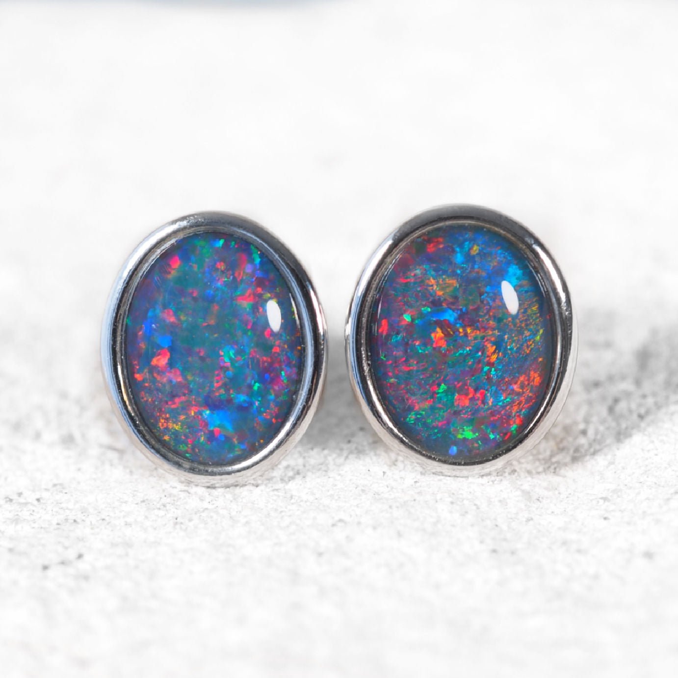 Large sterling silver stud opal earrings featuring bold multi-coloured Australian triplet opals