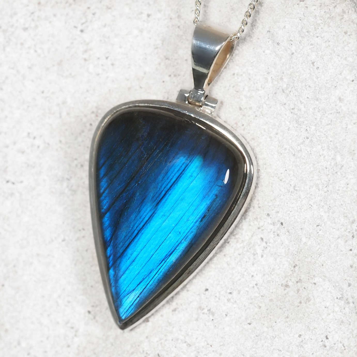 Labradorite pendant in sterling silver with natural blue shimmer.