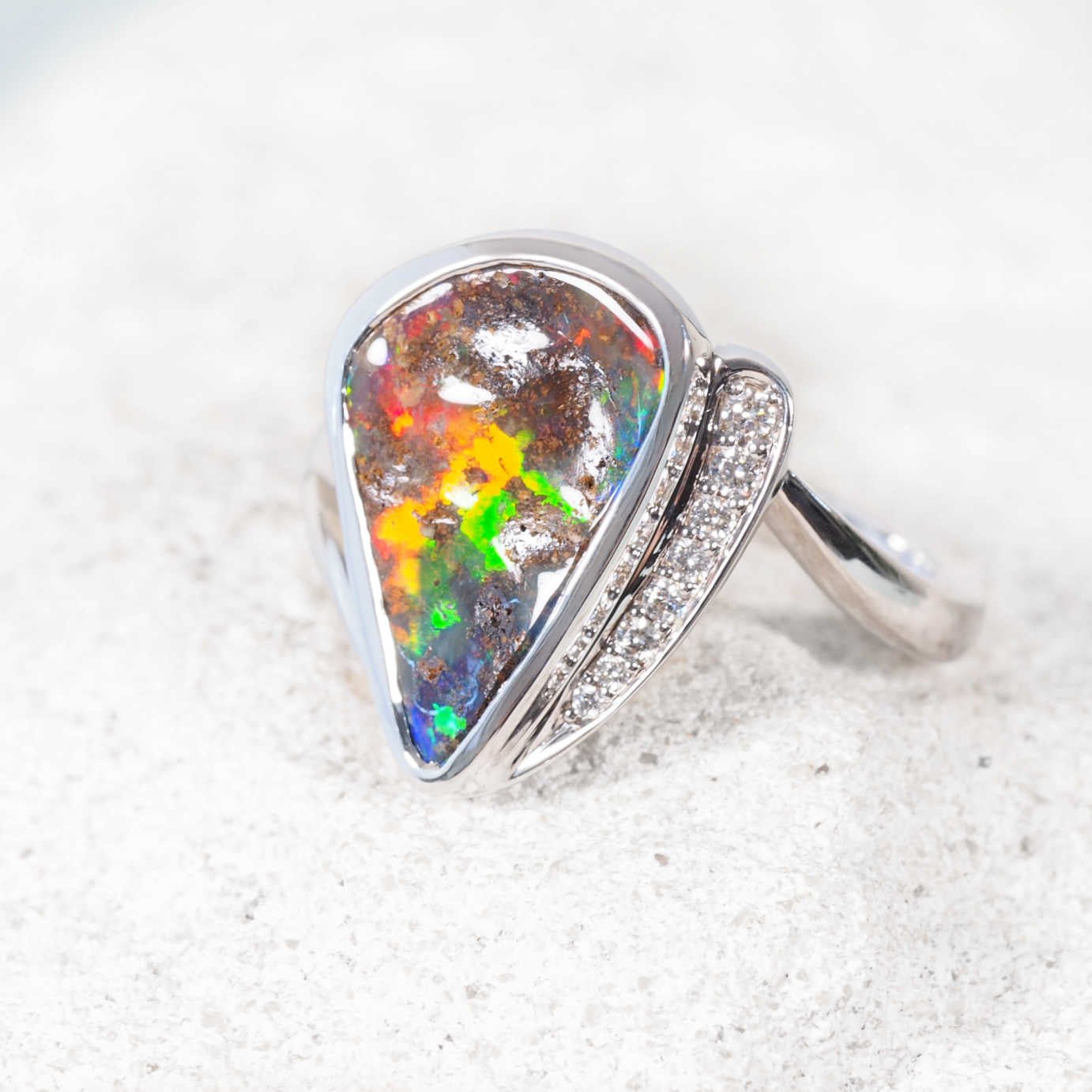 Luxury opal and diamond ring – 18ct white gold ring featuring solid boulder opal