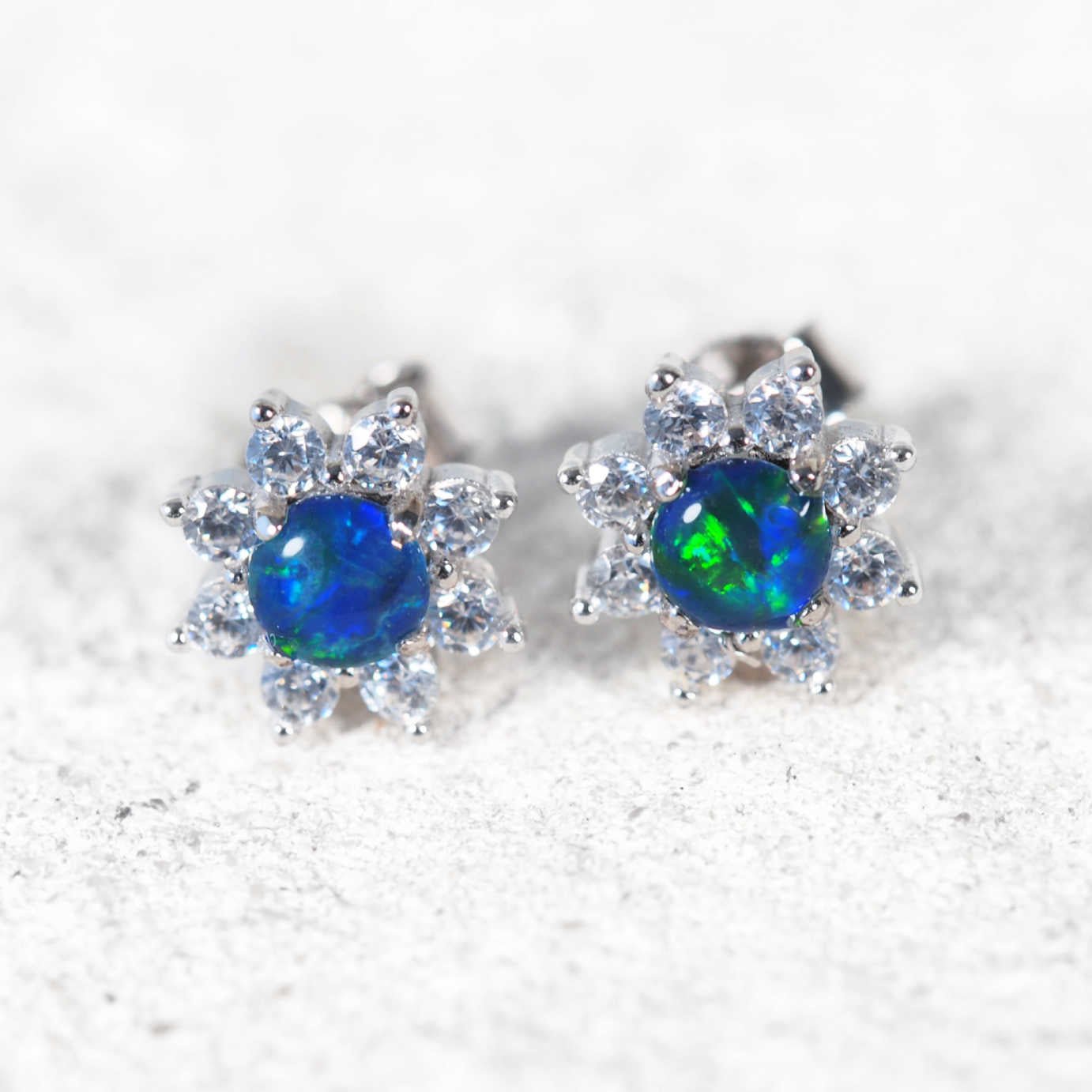 Sterling silver stud opal earrings with blue round triplet opals and crystal halo