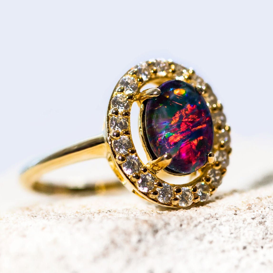coloiurful opal ring with diamantes in gold plated silver