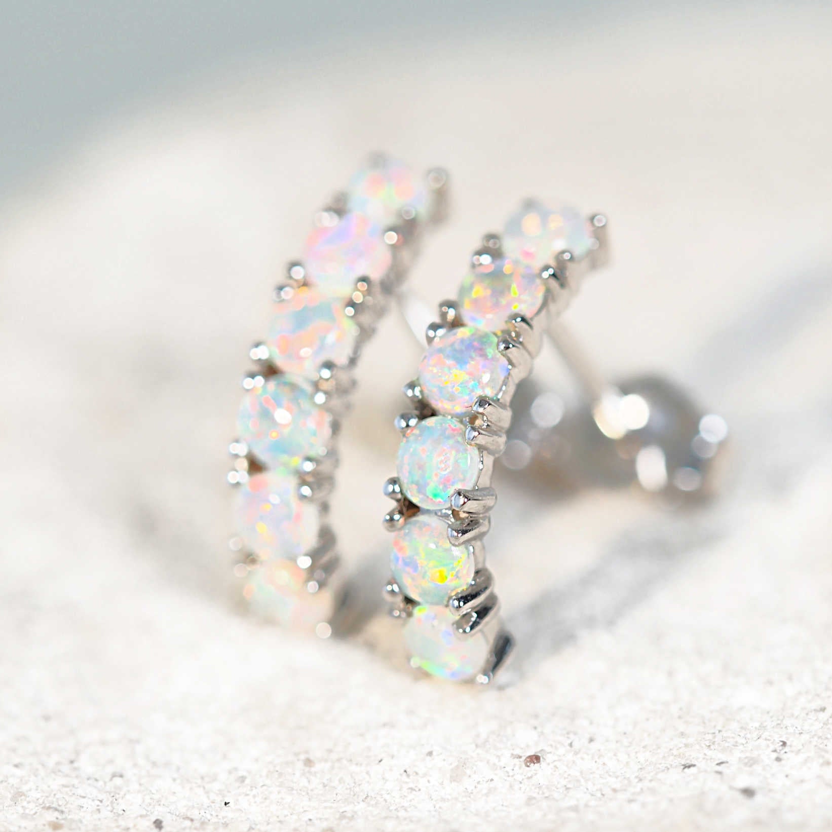 opal stud earrings set in white gold