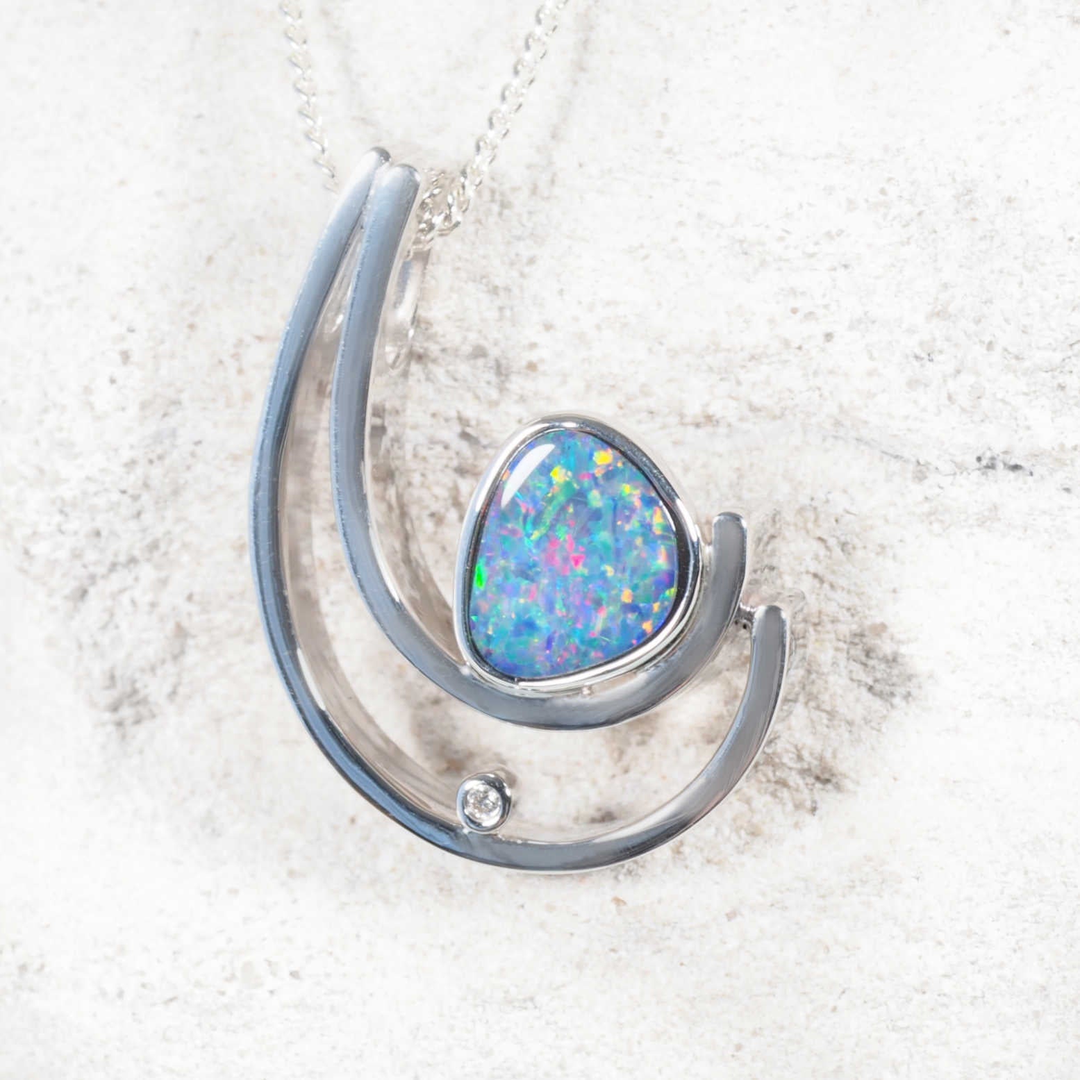 Sterling silver opal pendant with oval Australian doublet opal and crystal accent