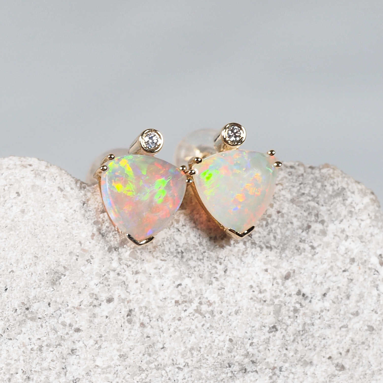 Triana opal stud earrings in 14ct yellow gold with triangular Coober Pedy opals