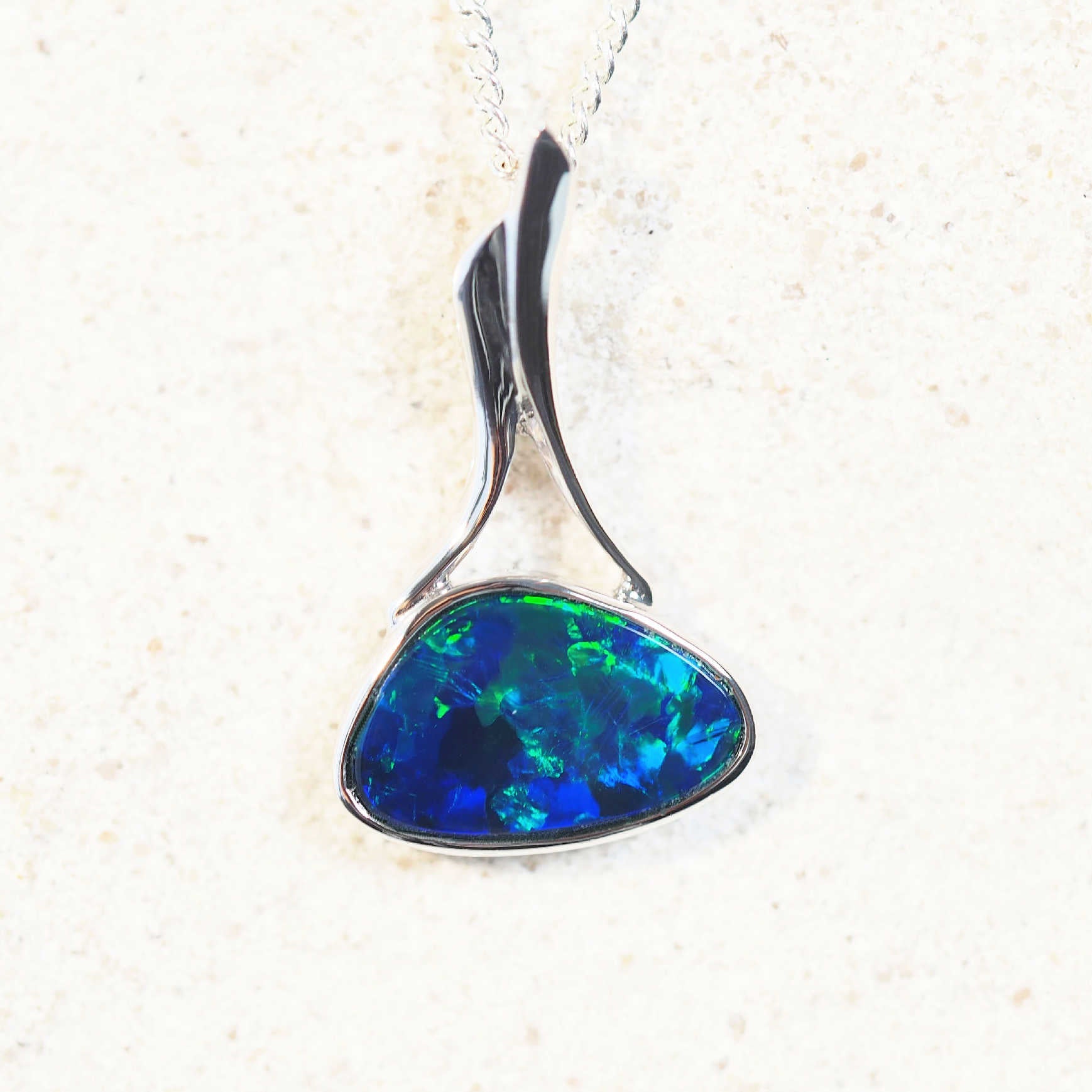 australian opal pendant set in white gold