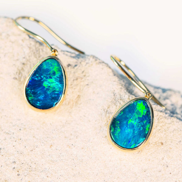 green and blue doublet opal earrings set in yellow gold