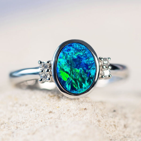 blue and green australian opal white gold ring with diamonds