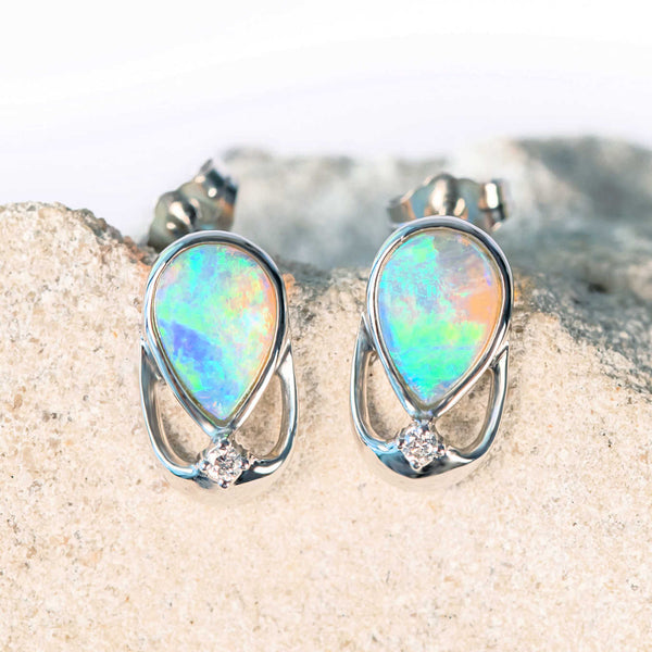 fluorescent green crystal opal stud earrings set in white gold