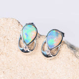 beautiful green crystal opal earrings with diamonds set in white gold