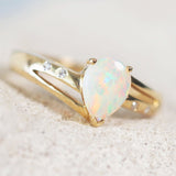 teardrop shaped colourful crystal opal gold ring withe four diamonds