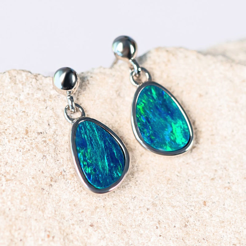 opal silver earrings set with green and blue doublet opals