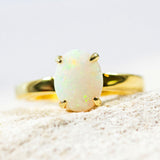 white opal classic design opal ring set in gold plated silver