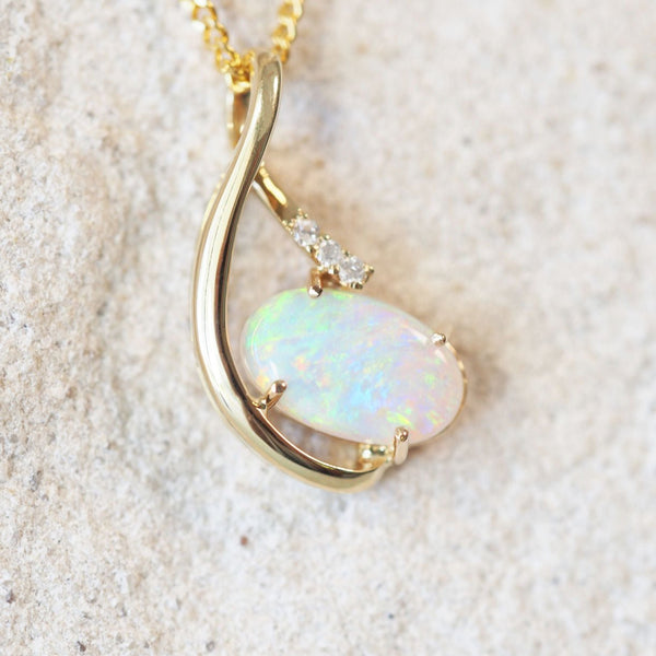colourful oval crystal opal gold pendant