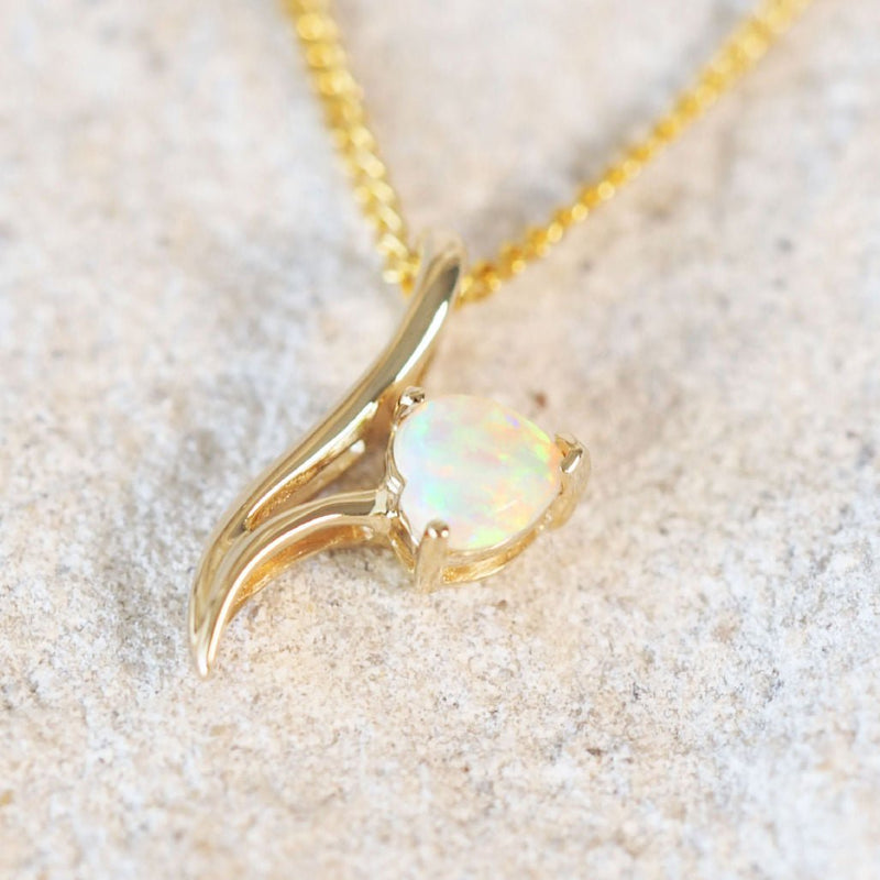 heart shaped crystal opal gold pendant