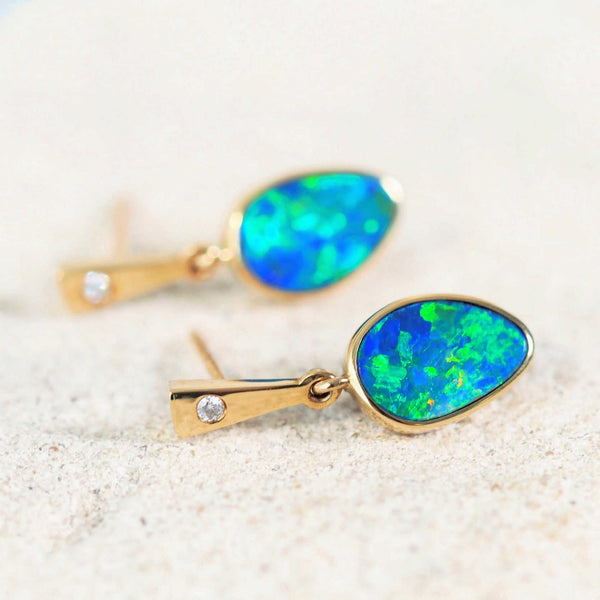 gold opal earrings set with blue and green doublet opals and diamonds