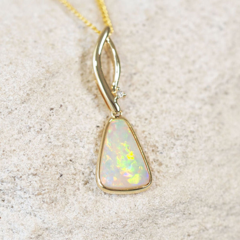 colourful crystal opal pendant set in yellow gold