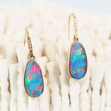 colourful australian doublet opal gold earrings set with eight diamonds