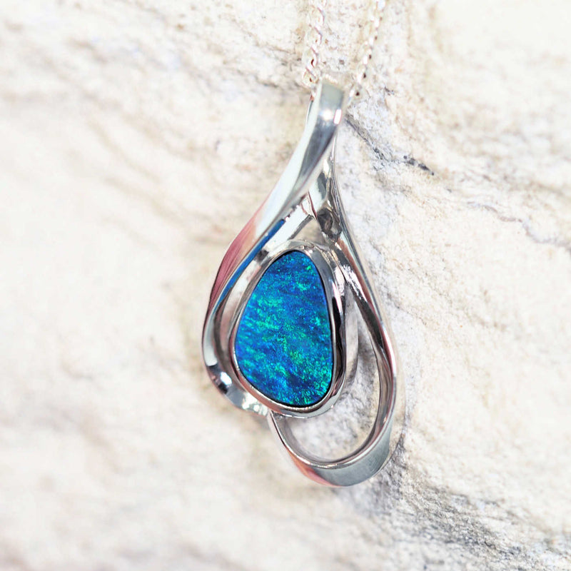 sterling silver doublet opal pendant set with a blue and green australian opal
