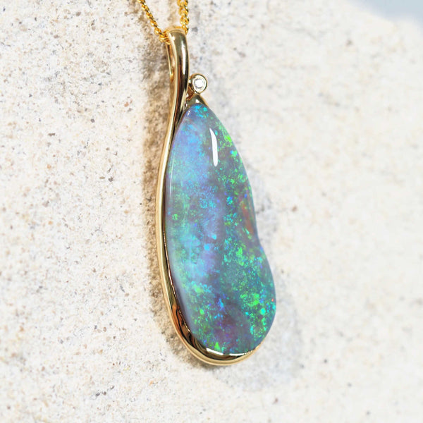 green crystal opal pendant set in 18ct yellow gold