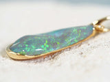 green crystal opal gold pendant and one diamond
