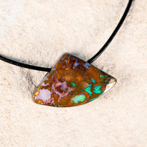 unique colourful queensland boulder opal pendant in matrix