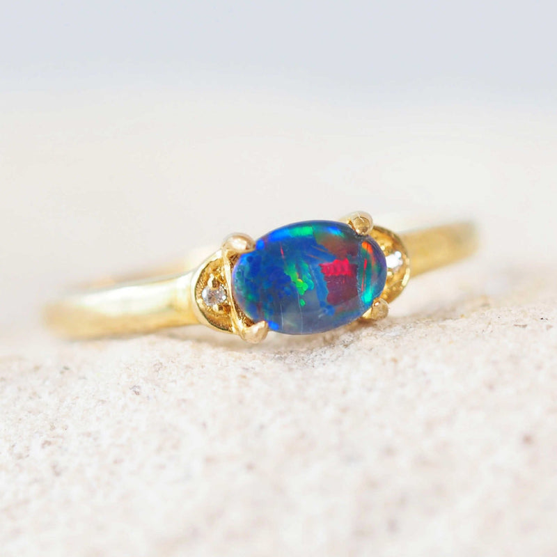 colourful triplet opal ring set in gold plated silver
