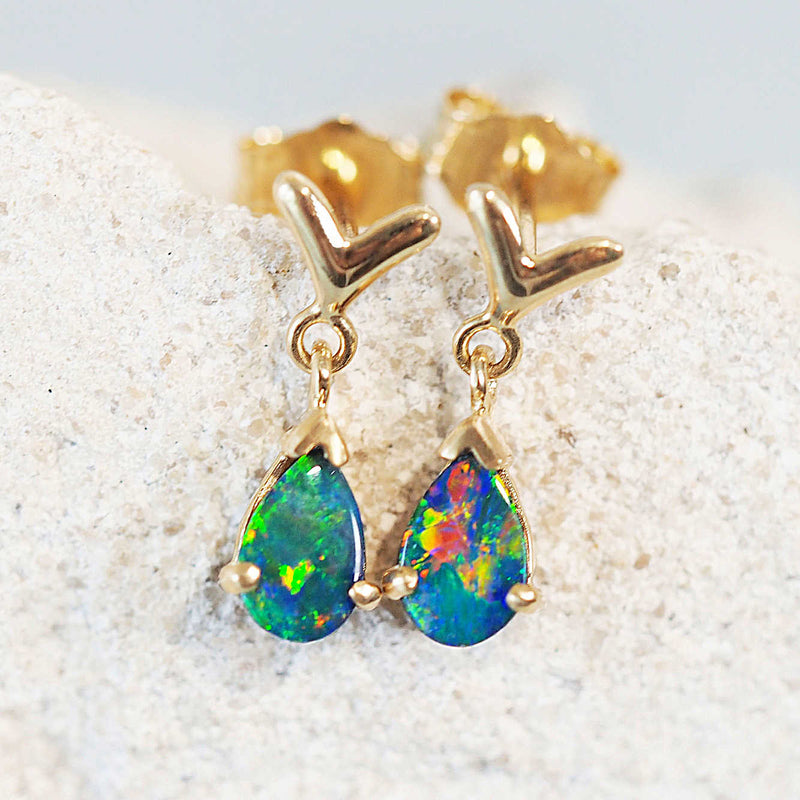 colourful gold doublet opal earrings set with teardrop shaped australian opals