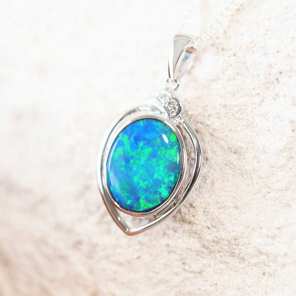 green and blue doublet opal necklace bezel set in 14ct white gold featuring an oval Australian opal