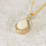 white opal gold pendant