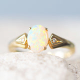 multi-colour oval crystal opal gold ring set with a solid Australian opal from Coober Pedy