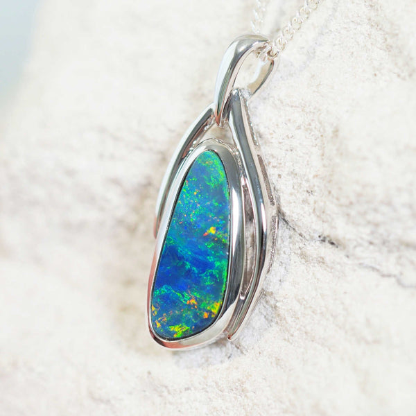 blue and green doublet opal pendant set in sterling silver with sunset hued highlights