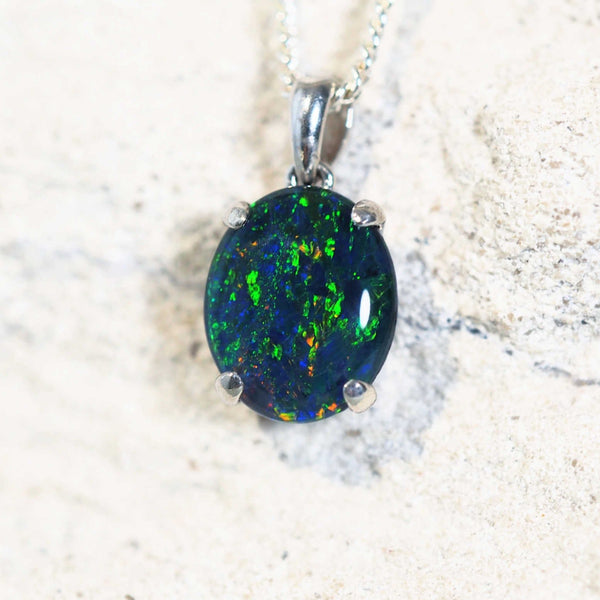 blue australian opal necklace pendant featuring a multi-coloured triplet opal set into sterling silver