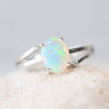 australian opal ring set with a green crystal opal and two diamonds